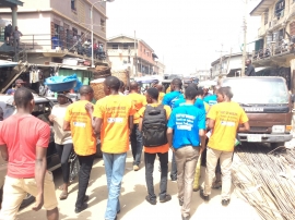 WOCONs Team dancing round Oyingbo Market at the Market Outreach
